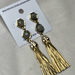 "WHBM Gold-colored metallic earrings."